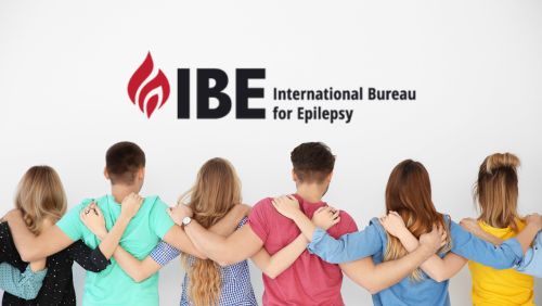 Young People arm in arm and the IBE Logo