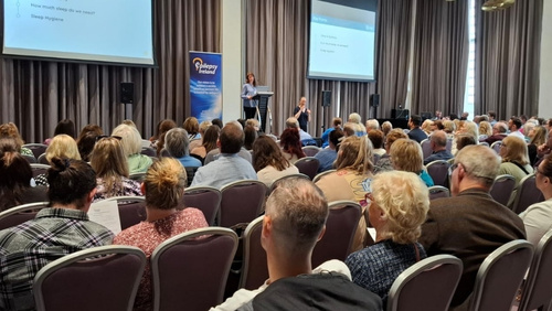 Attendees listening to a presentation at our 2024 National Conference