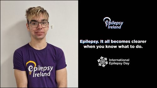 Andrew to the LHS of the picture with EI Logo and message: Epilepsy, it all becomes clearer when you know what to do on a black background with International Epilepsy Day logo at bottom