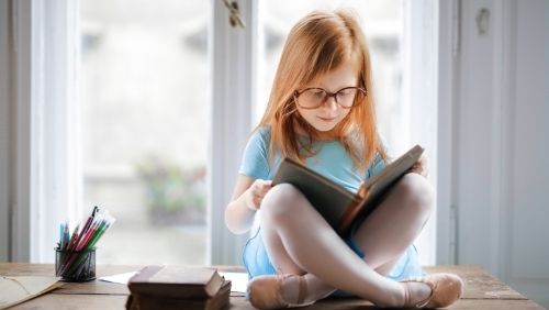 child reading book