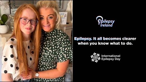 Maisie Mae and her Mum to the LHS of the picture with EI Logo and message: Epilepsy, it all becomes clearer when you know what to do on a black background with International Epilepsy Day logo at bottom