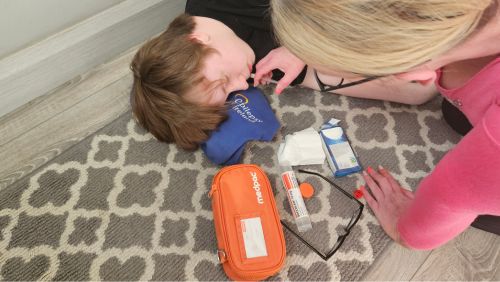 Person administering buccal midazolam 