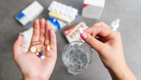 Person holding medication 