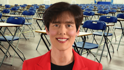 Minister Norma Foley TD with the background of an empty exam hall