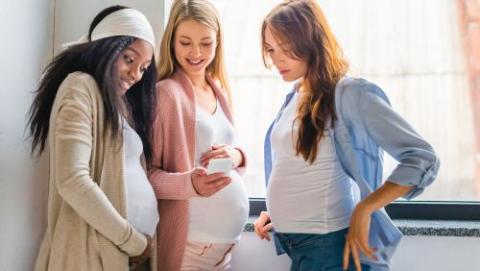 Three pregnant women